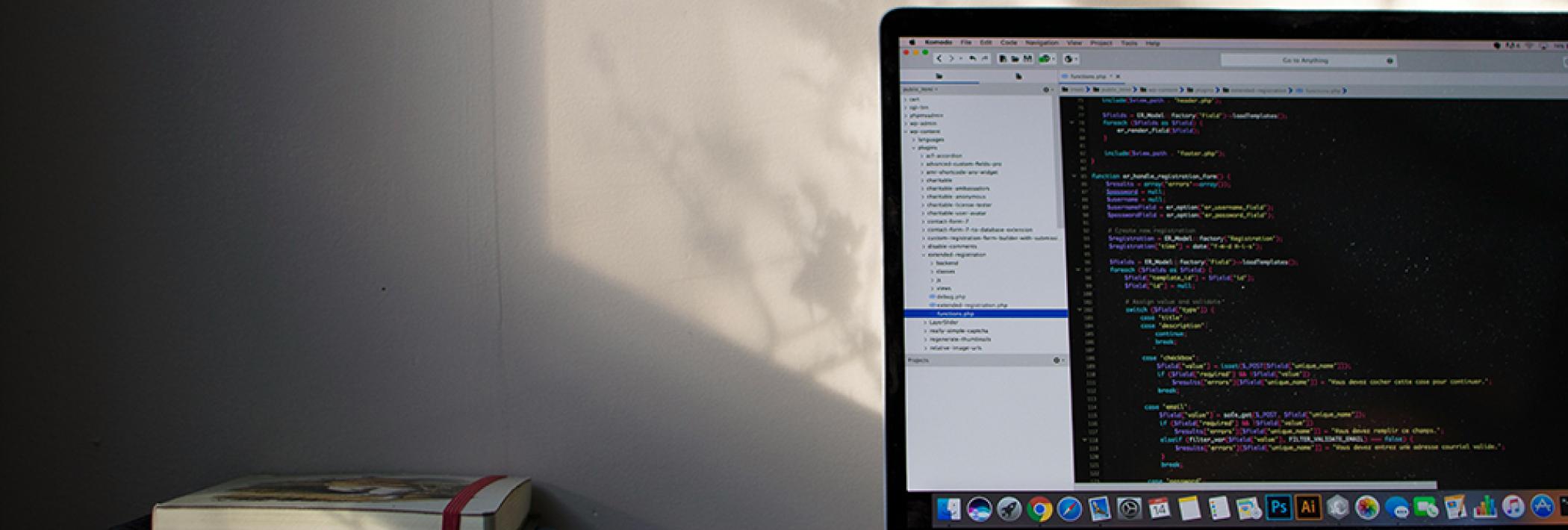 computer screen and books